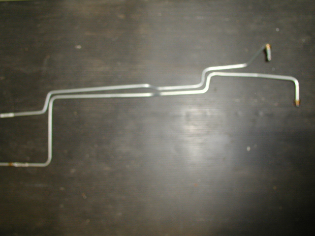 New transmission cooler lines fabricated from 3/8" brake line. The AOD requires more flow than the C-4 or C-6.
