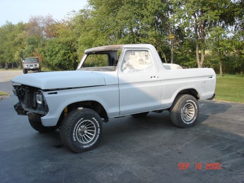 1979 Ford Bronco - This 1979 Ford Bronco is shown in primer, with a second vehicle in the background.