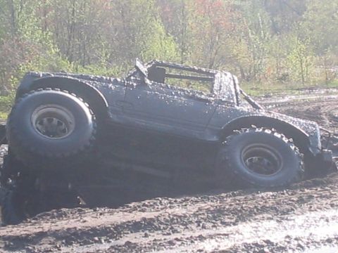 1987 Suzuki Samurai - This 1987 Suzuki Samurai is stuck deep in the mud after an off-road excursion.