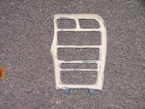 1994 Ford Probe - A beige car interior trim piece, likely for a dashboard, is shown with visible repair work and sanding marks.
