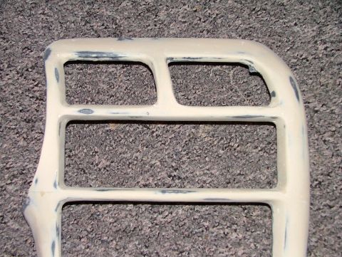 1994 Ford Probe - Dashboard vent trim piece with rectangular openings, likely for a car's interior.