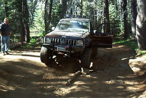 1986 Ford Bronco - This is my cousin Ryan's XJ. He's got 8" of lift some trimming, Bushwacker flares, and 35s. He's running open with stock axles and diffs. H…