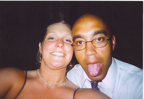 1991 Ford Bronco - A couple poses for a selfie, with one person playfully sticking out their tongue.