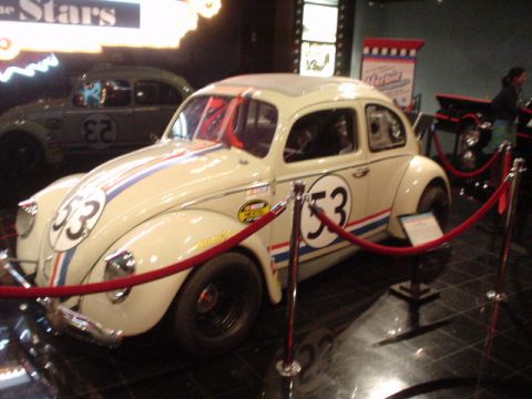 1968 Ford Mustang - A Volkswagen Beetle, famously known as Herbie, is displayed with racing stripes and the number 53.