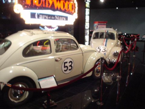 1968 Ford Mustang - Two white Volkswagen Beetles, famous movie cars, are on display at the Petersen Auto Museum.