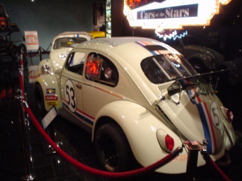 1968 Ford Mustang - A white Volkswagen Beetle, famous as Herbie the Love Bug, is displayed with racing stripes and the number 53.