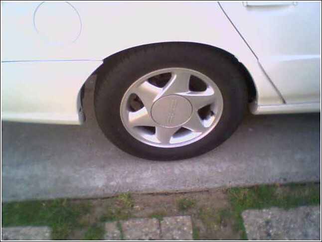 1993 Ford Taurus rear wheel and fender