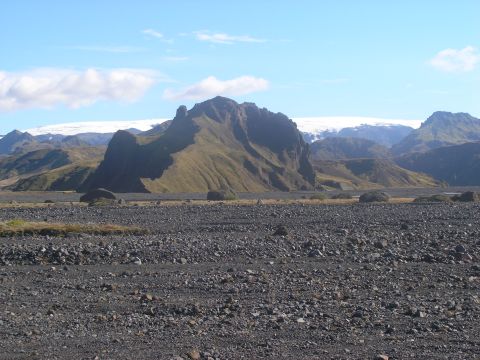 2001 Jeep Wrangler - Mountain landscape with a rocky foreground and a glacier in the background. Supermotors.net logo visible.