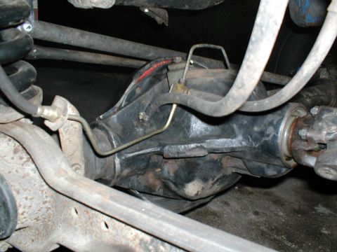 1979 Ford Bronco - Close-up view of a vehicle's differential housing and associated suspension components.