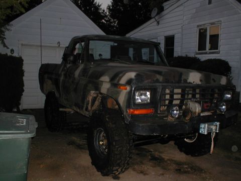 1979 Ford Bronco - This 1979 Ford F-150 pickup truck features camouflage paint and is equipped for off-road use.