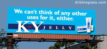 2005 BMW 3 Series - A billboard displays an advertisement for KY Jelly, the product and a slogan.