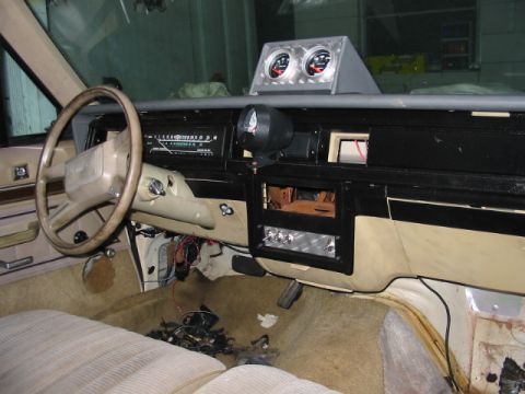 1985 Ford LTD Crown Victoria - Interior view of a 1985 Ford Crown Victoria LTD, a dashboard with added gauges.