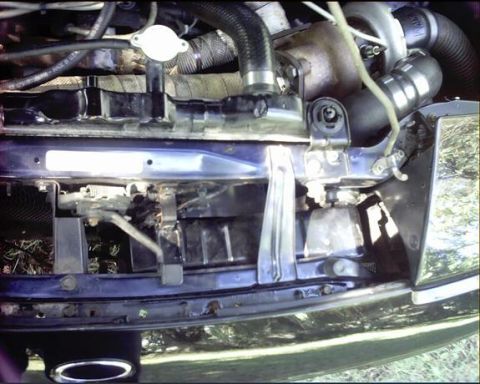 1992 Ford Probe - Engine bay components including radiator, hoses, and part of the turbocharger are visible.