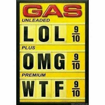 1972 Ford Ranchero - A humorous gas price sign displays joke fuel grades and prices, not a vehicle.