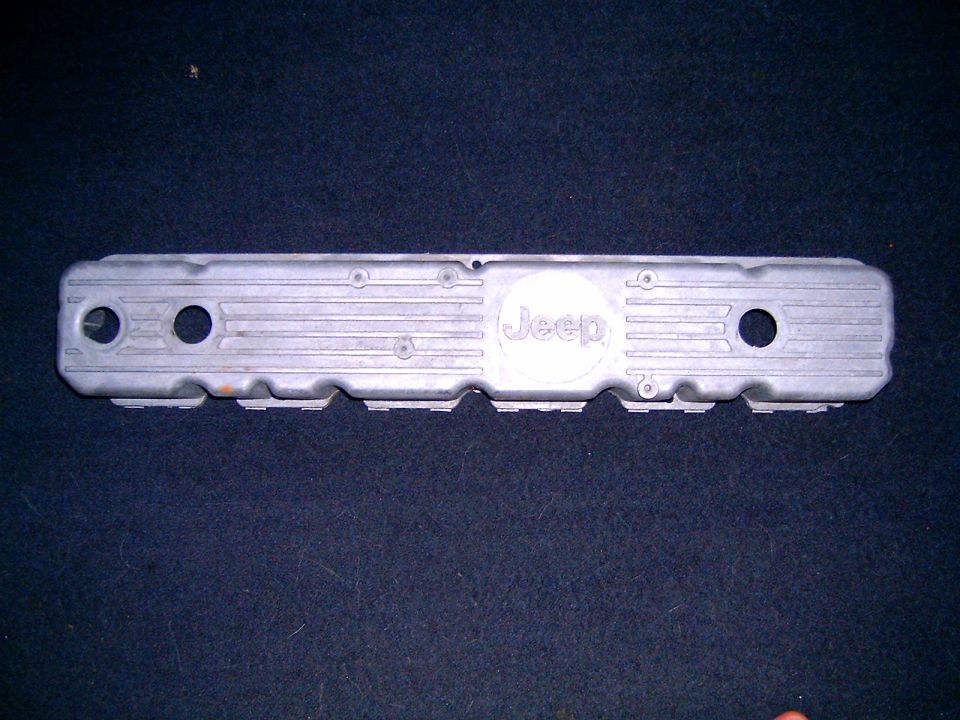 Aluminum Jeep valve cover with embossed Jeep logo and ribbed texture