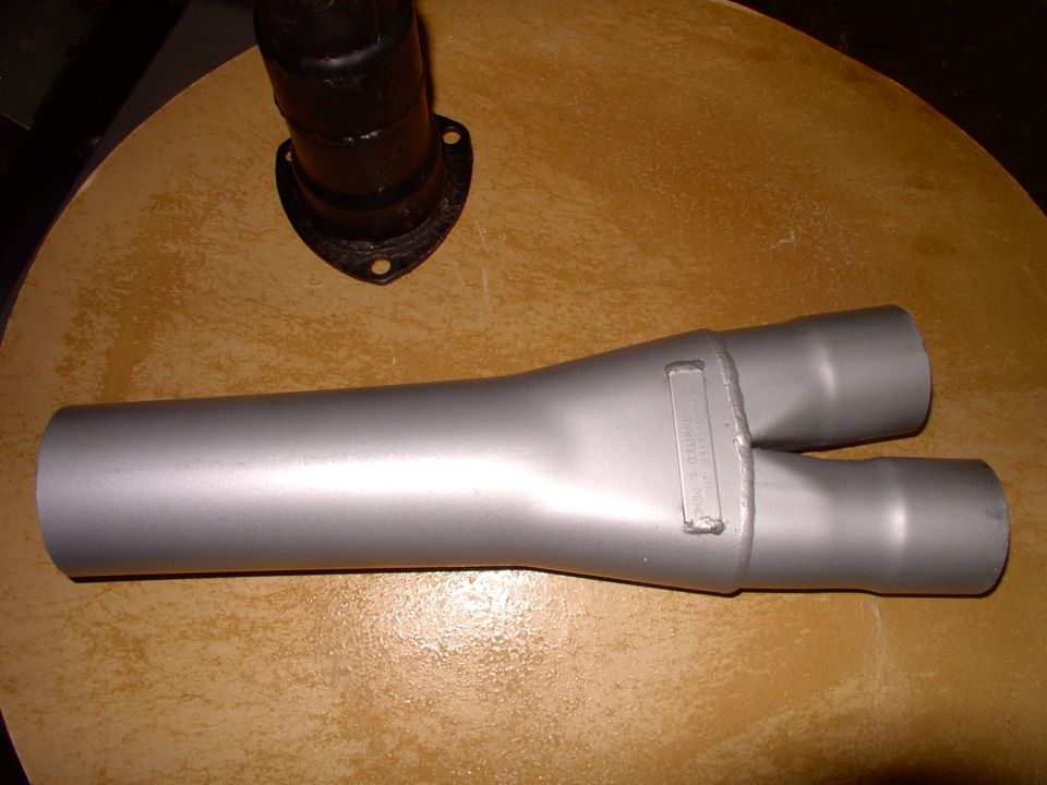 Two 2 1/4" pipes enter, One 3" pipe exits. This is Flowmaster Y collector part # 300214A.  At $34.00 it's a pretty good deal. They claim it's worth 25-40 ft/lbs of torque and after using it on my Bronco I believe  it !