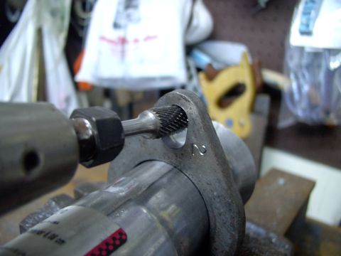 1990 Lincoln Town Car - My die grinder made short work of opening them up until they were plenty big enough to accept the Lincoln's manifold studs. A normal power…