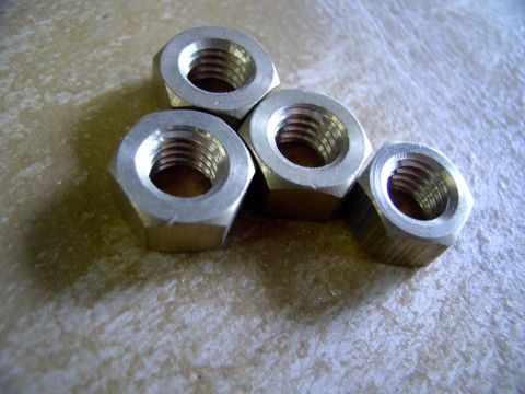 1990 Lincoln Town Car - Brass nuts are cheap, like a buck each cheap. What would you pay later to have this come off so easily ? They are 7/16 UNC-14 on a Lincoln