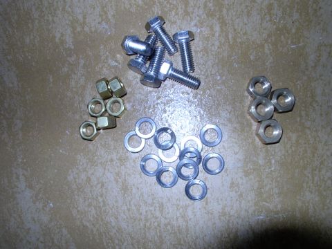 1990 Lincoln Town Car - Stainless 3/8" bolts (an inch long), stainless lock washers and brass 3/8" nuts are the way to go if you want to get them off again in the…
