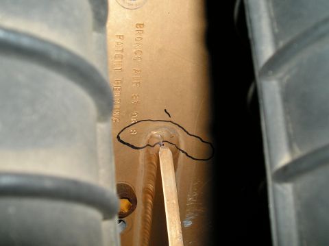 1993 Ford Bronco - Part of a Bronco air intake system, stamped with 8/27/96 and patent pending.