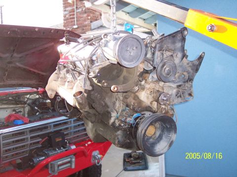 1985 Ford Bronco - Engine removed from a vehicle, with a date stamp of 2005/08/16 visible on the right side.