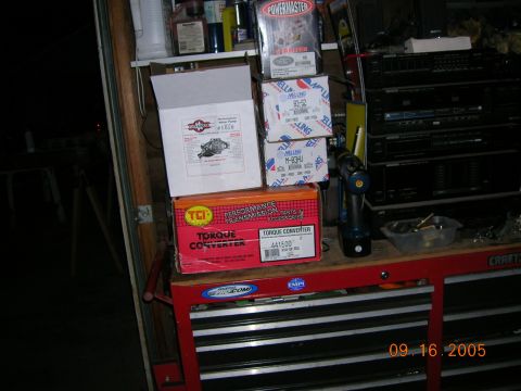 1985 Ford Bronco - Various engine and transmission parts are organized on a red toolbox, with a date stamp of 09.16.2005.