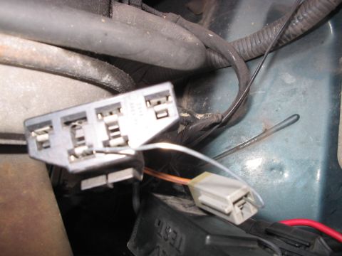 1992 Ford Bronco - This image shows a close-up view of an automotive electrical connector and wiring, not a 1992 Ford Bronco.