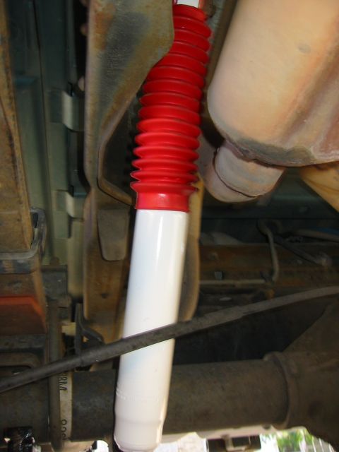 1996 Ford Bronco - passenger's side. just me or does the s-d exhaust run it pretty close to the shock boot and break lines? Anyone have some solutions that wo…