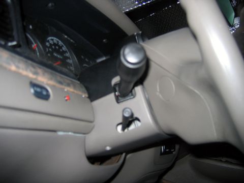 2000 Ford Crown Victoria - The interior of a 2000 Ford Crown Victoria, showing the dashboard and steering column details.