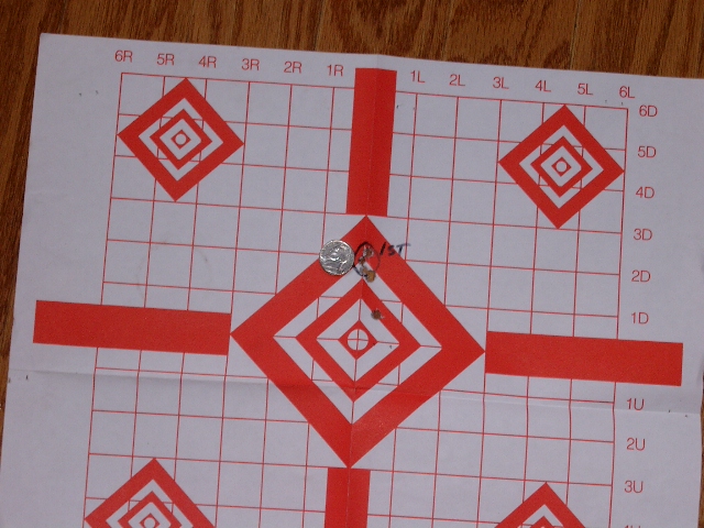 First six shoots out of my virgin 6.5mm x .06.  That is a nickel for refference.