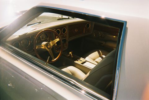 1972 Ford Ranchero - The interior of a 1972 Ford Ranchero shows off its classic design with woodgrain dashboard and tan seats.
