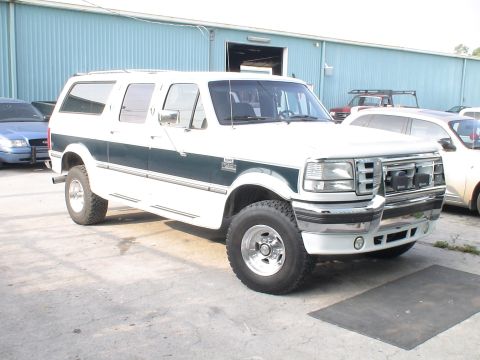 1993 Ford C-350 (Centurion Conversions) - modified front end & new rims and tires