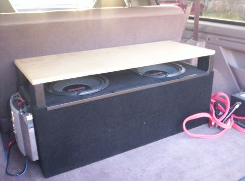 1995 Ford Bronco - Subulars. Two 12" Pioneer 450w Subs, 600w amp from Boss, custom built box.