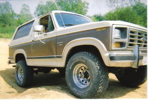 1982 Ford Bronco - This 1982 Ford Bronco is shown from a 3/4 front angle, highlighting its two-tone paint scheme.