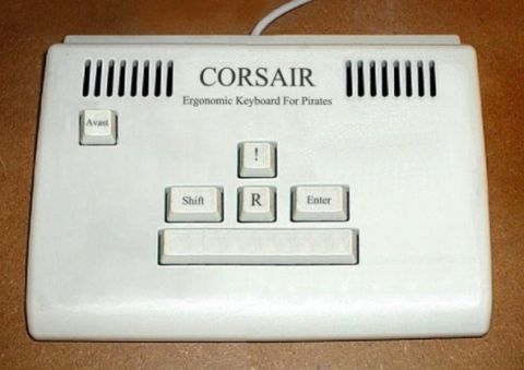 1989 Ford Bronco - This is a Corsair keyboard labeled 'Ergonomic Keyboard For Pirates'.