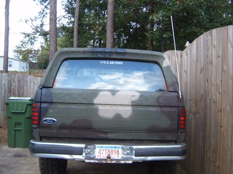 1988 Ford Bronco - This Ford Bronco has a custom camouflage paint job and a sticker indicating U.S. Air Force affiliation.