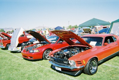1972 Ford Ranchero - Cars displayed with hoods open at a car show, a 1970 Ford Mustang in the foreground.