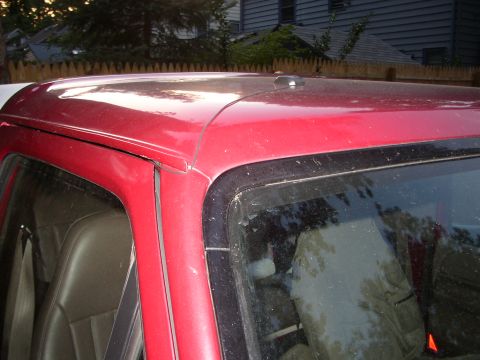 1995 Ford Bronco - Interior view of a 1995 Ford Bronco, focusing on the roofline and seats.