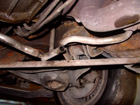 1990 Lincoln Town Car - Knowing we're only going to use one of the air pump pipes, we cut one and loosened off the other one (we'll cap it later).