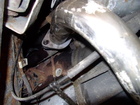 1990 Lincoln Town Car - Trial bent 105 degree pipe slips over the flared pipe stub and clears the TV cable with plenty to spare.