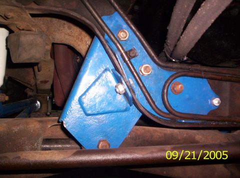 1985 Ford Bronco - Close-up of a blue suspension part on a vehicle's undercarriage, with a date stamp of 09/21/2005.