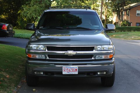 2001 Ford Crown Victoria - This Chevrolet Suburban is seen from the front, displaying its Massachusetts license plate.