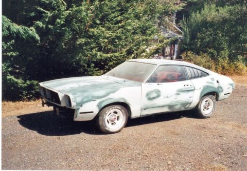 1978 Ford Mustang II - This 1978 Ford Mustang II is in primer, indicating it is being prepped for paint.
