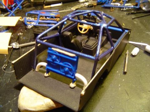 1979 Ford Bronco - Model car build in progress, showing the interior and roll cage assembly.