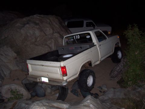 1981 Ford F-150 - Down, and sitting against the rock