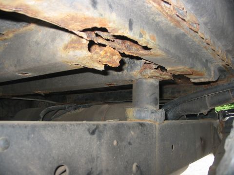 1985 Ford Bronco - Severe frame rust is evident, compromising the structural integrity of the vehicle.