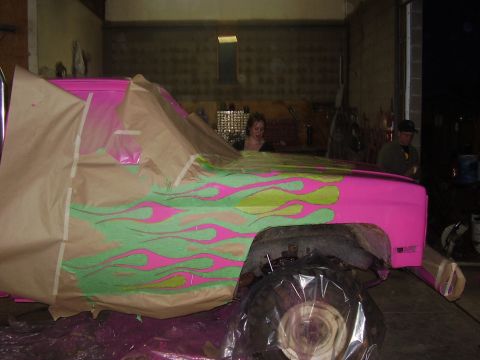 1981 Chevrolet C/K Pickup - Truck bodywork in progress, showing flame graphics being applied.