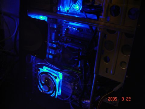 1993 Ford Bronco - Internal components of a computer glow with blue LED lighting, showing fans and circuitry.