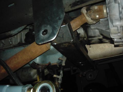 1978 Ford Bronco - Undercarriage view of a vehicle's drivetrain and suspension components.