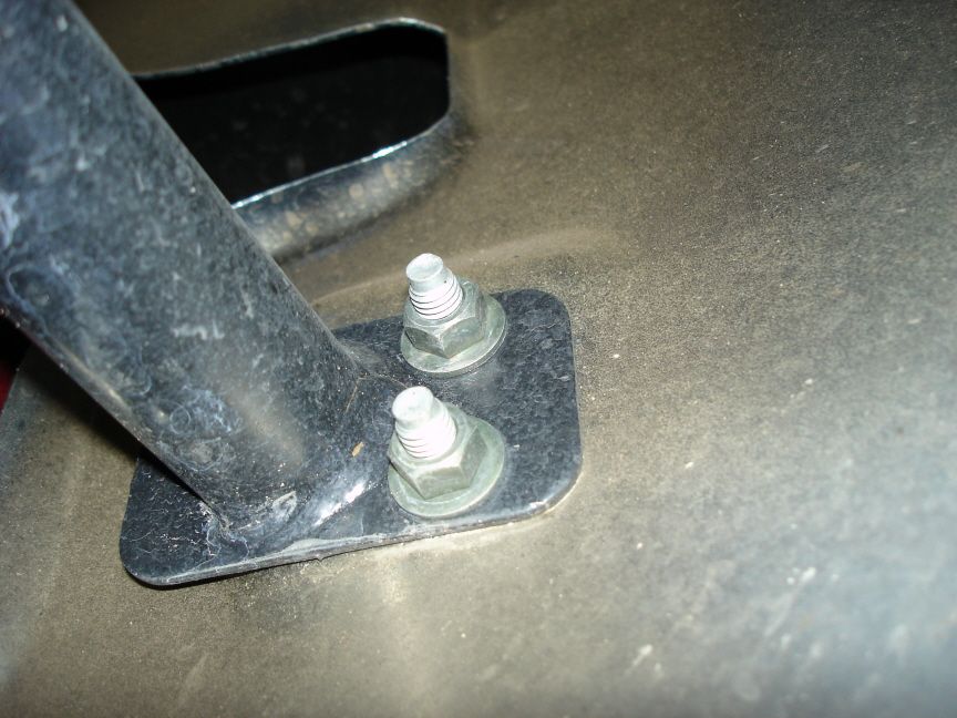 Black bumper mount plate with two zinc flange nuts on studs